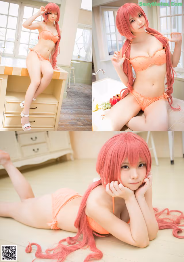 A woman with long pink hair in a bikini posing for a picture.