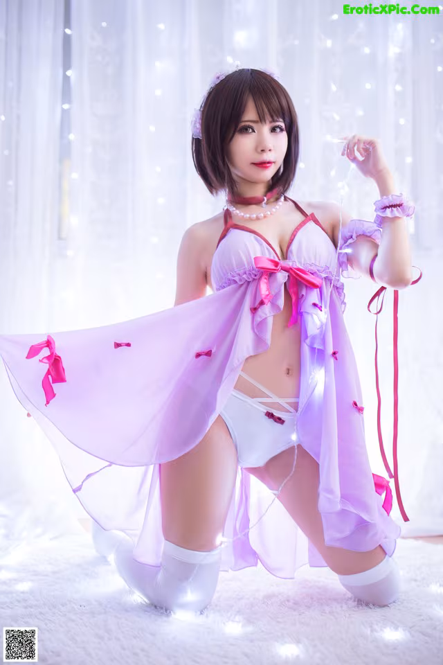 A woman in a pink and white lingerie posing for a picture.
